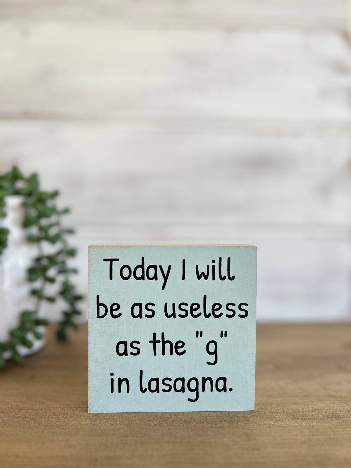 Useless as the “g” in Lasagna Wood Sign