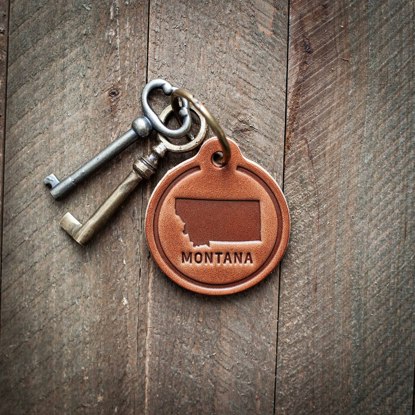 Montana State Silhouette Leather Keychain Circle