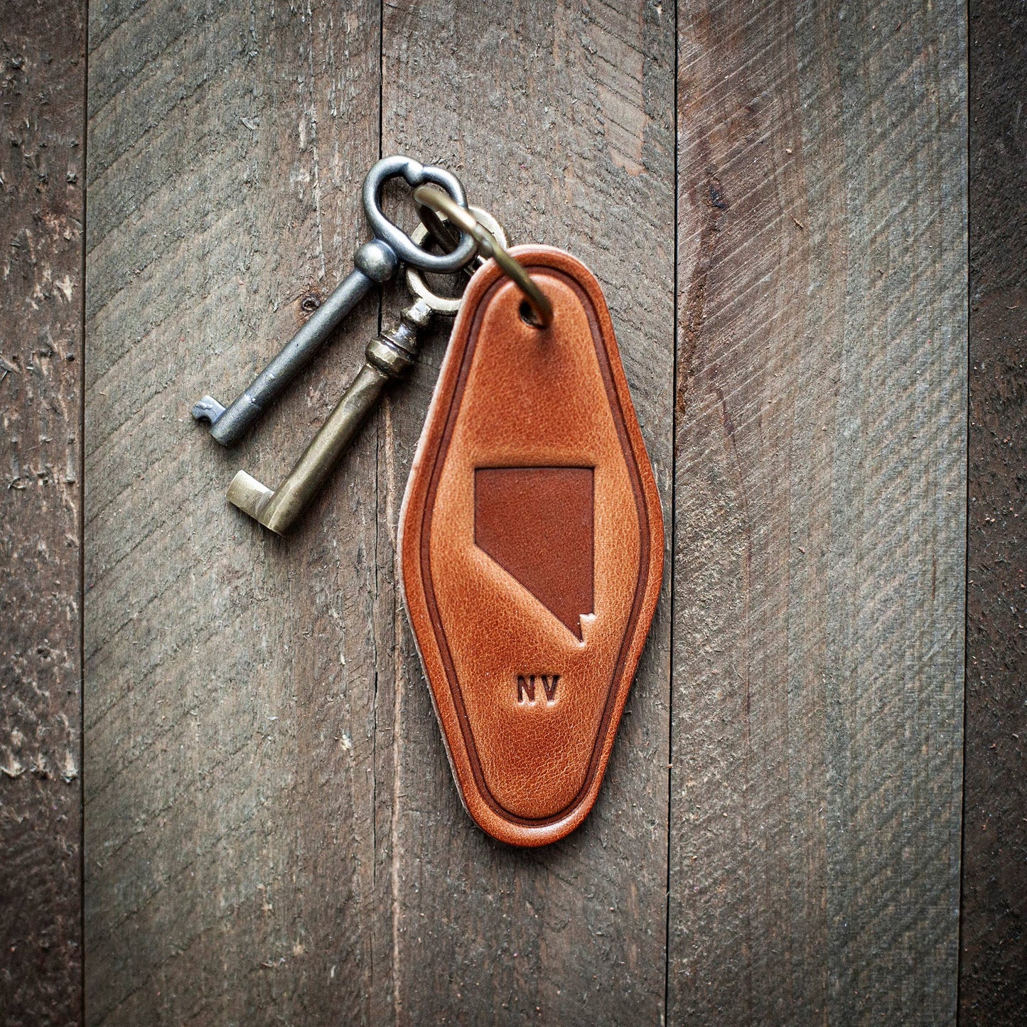 Nevada State Silhouette Leather Keychain Motel Style
