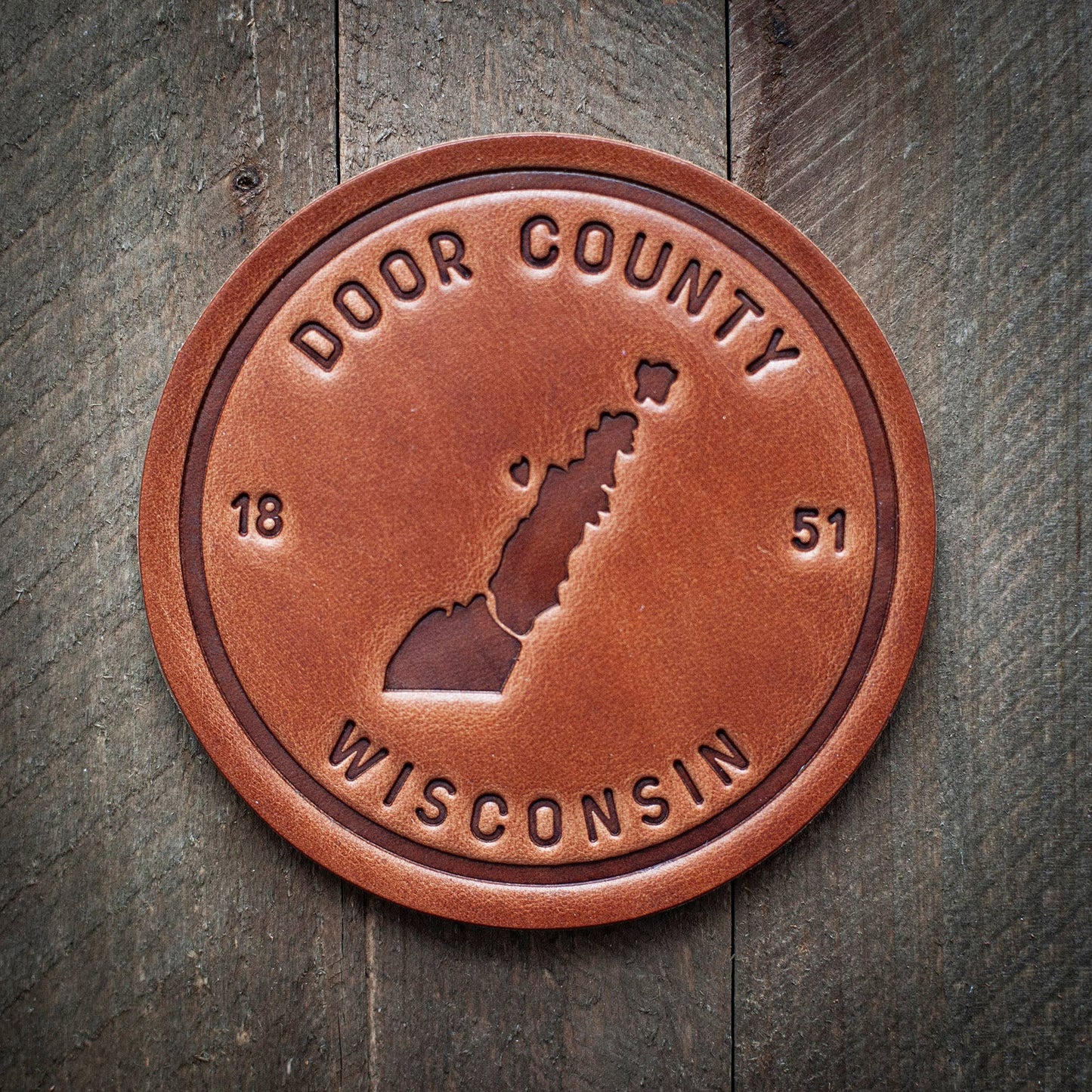 Door County Wisconsin Silhouette Leather Coaster