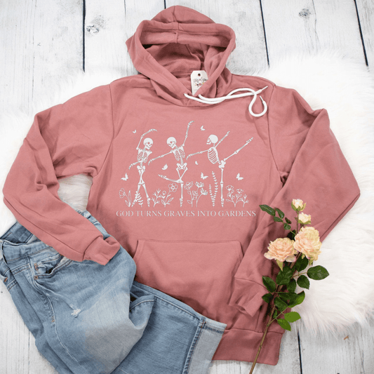 God Turns Graves Into Gardens Premium Fleece Hoodie