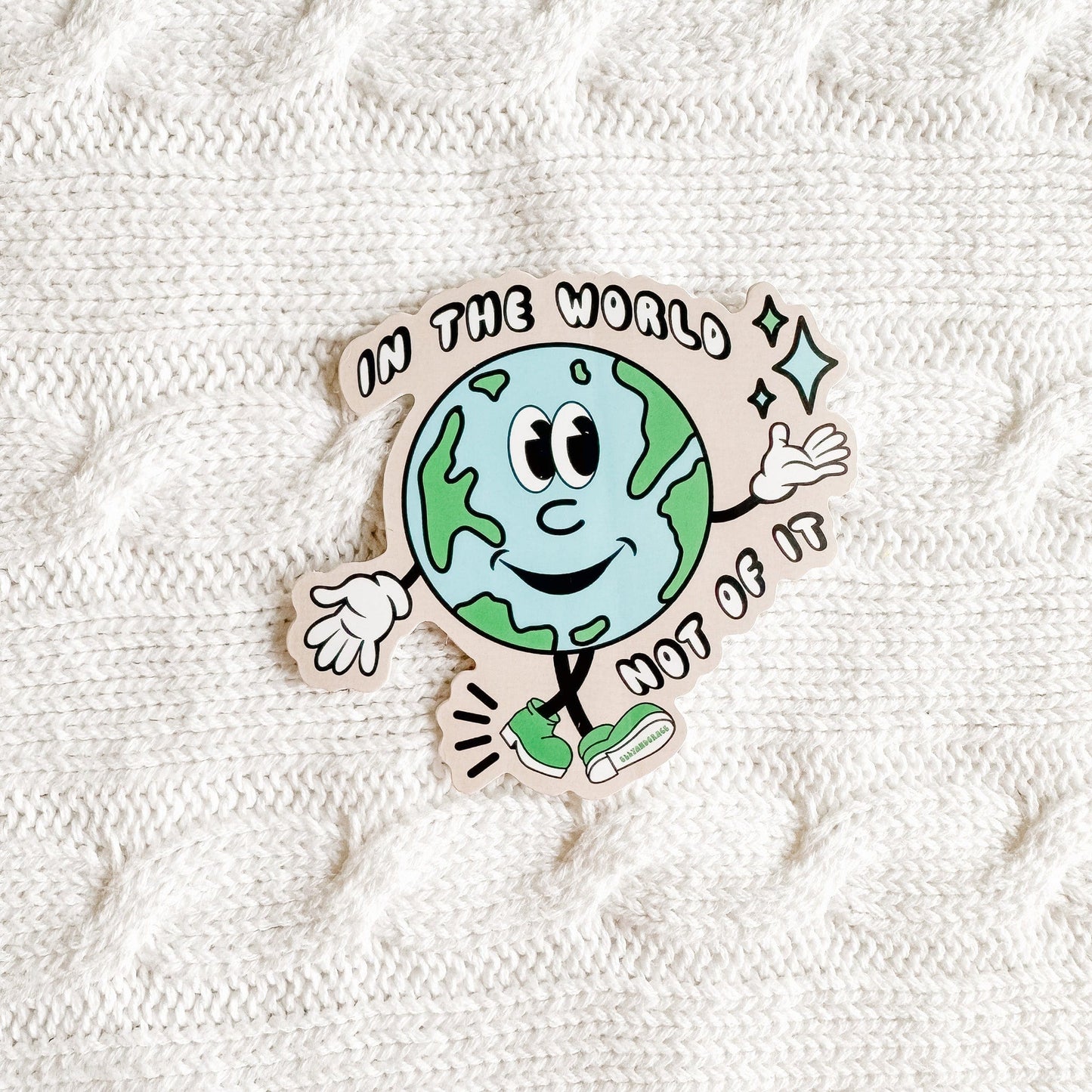 In The World Not Of It Sticker