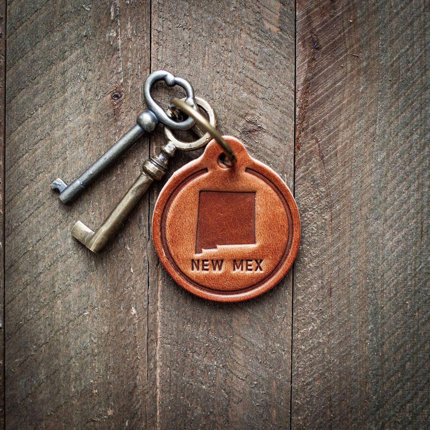 New Mexico State Silhouette Leather Keychain Circle